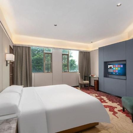 Mizparton Hotel South Qianjin Road Heshan  ภายนอก รูปภาพ