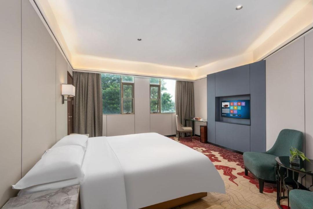 Mizparton Hotel South Qianjin Road Heshan  ภายนอก รูปภาพ